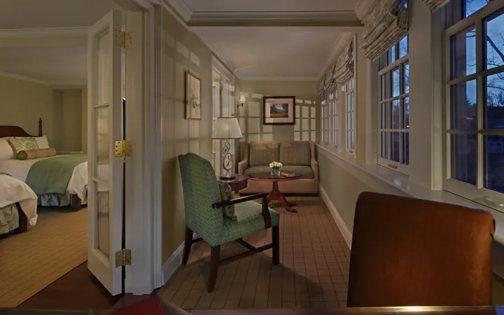 Room with a sitting area at The Inn on Boltwood