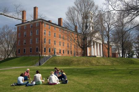 College students sitting on the grass at Amherst College