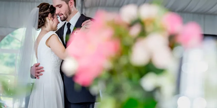Couple Holding Hands During Their First Dance